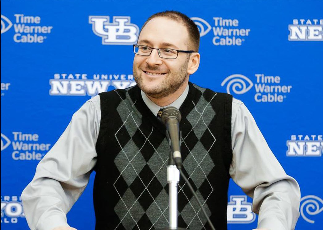 Brian Wolff at a University at Buffalo athletics press conference podium